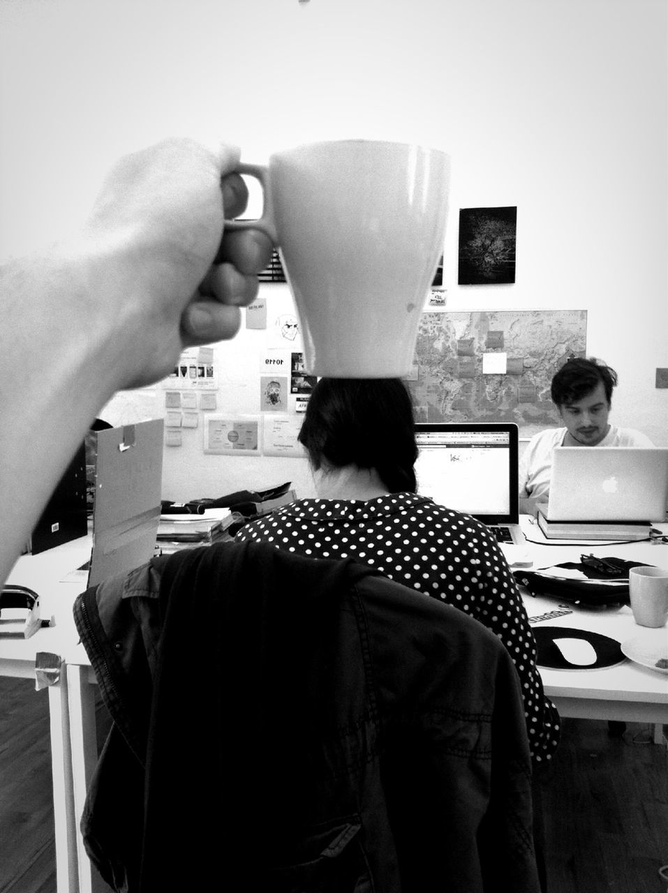 lifestyles, casual clothing, indoors, leisure activity, young men, young adult, sitting, three quarter length, men, waist up, holding, standing, person, togetherness, front view, rear view