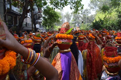 Rear view of people in traditional clothing