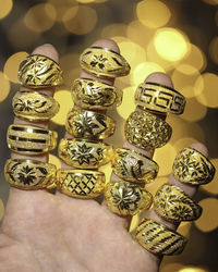 Close-up of hand holding paper