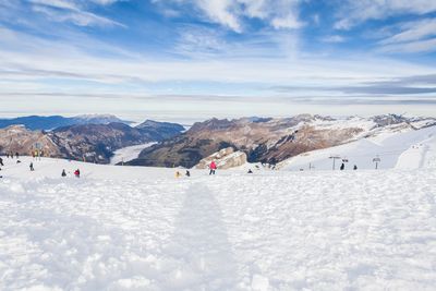 Scenic view of snow mountains against sky