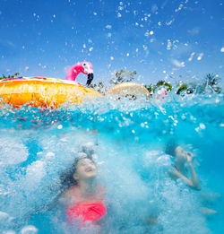 People swimming in pool