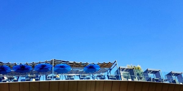 Low angle view of building against blue sky