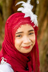 Portrait of smiling girl wearing hat