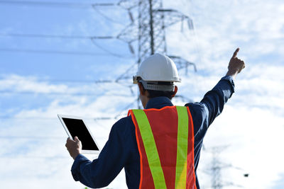 Man working on mobile phone