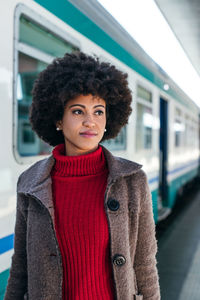 Portrait of a business woman at train station