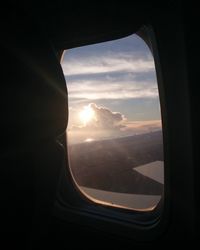 Aerial view of landscape seen through airplane window