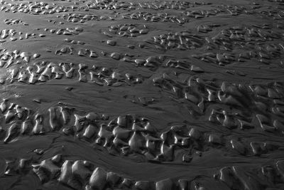 Full frame shot of sand in sea