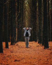 Man standing in forest