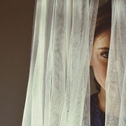Close-up of woman standing on fabric