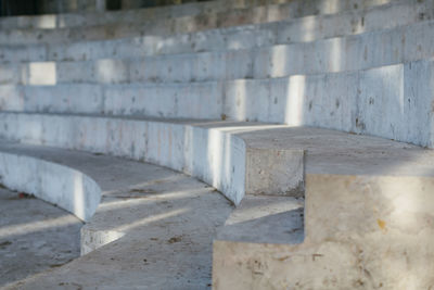 Photo of building under construction, selective focus on in the foreground, amphitheater, scene