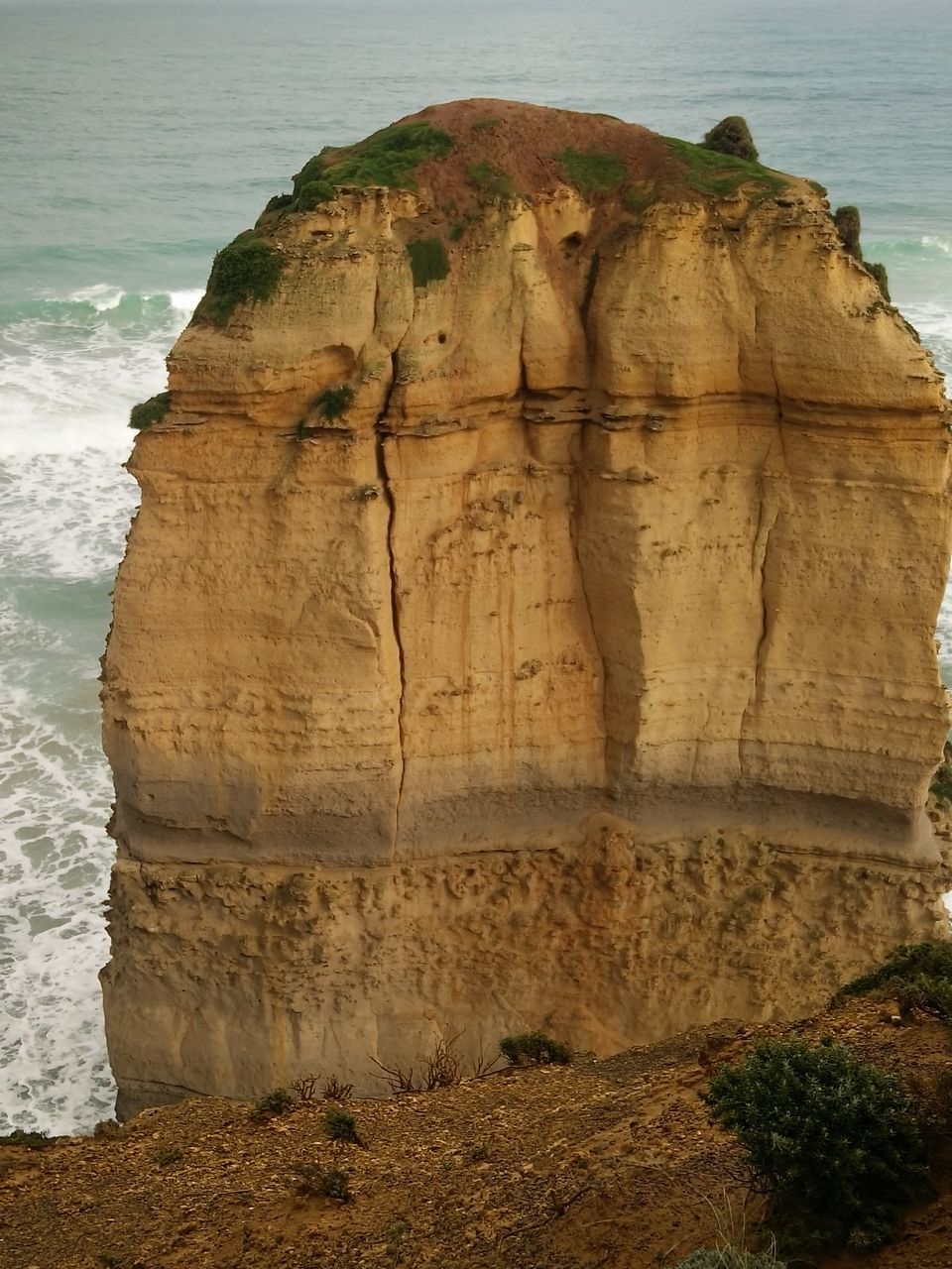 sea, rock - object, rock formation, nature, water, beauty in nature, tranquility, no people, tranquil scene, day, outdoors, travel destinations, scenics, beach, sky