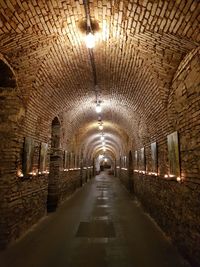 Man in illuminated tunnel