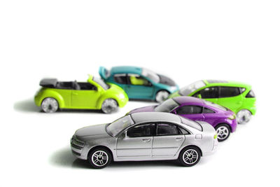 Close-up of toy car against white background