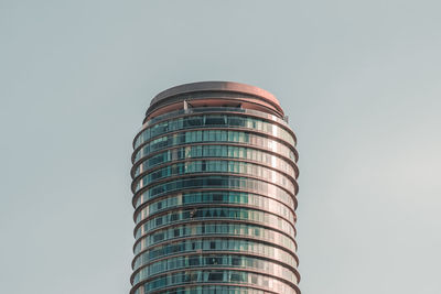 Low angle view of skyscraper against clear sky