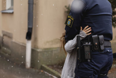 Police woman hugging daughter