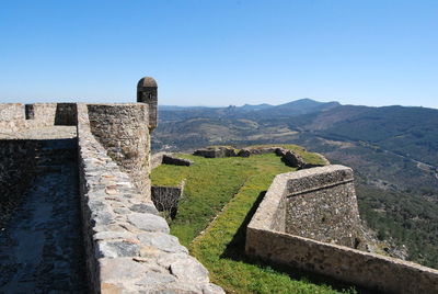 Ruins of fort against clear sky