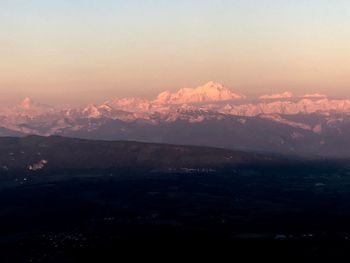 Scenic view of mountains against sky during sunset