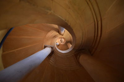 Directly below view of spiral staircase