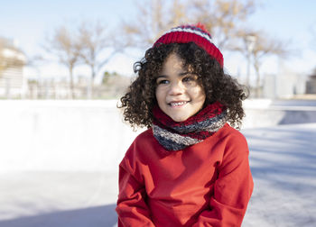 Portrait of smiling woman in snow