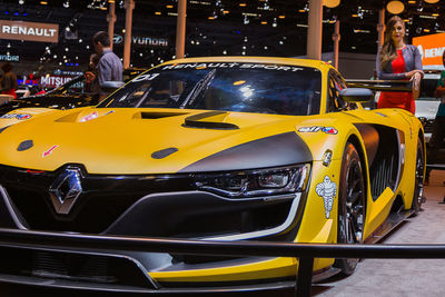 Yellow car on city street