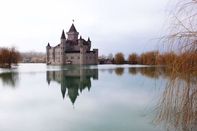 Reflection of building in lake