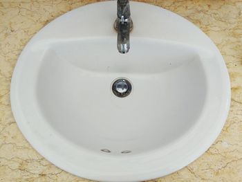 High angle view of faucet in bathroom