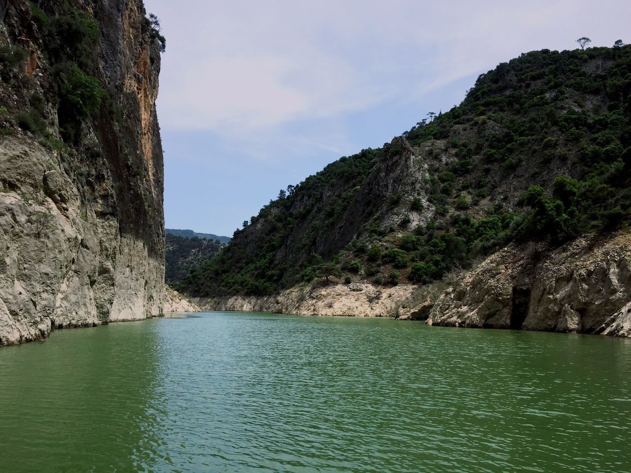 nature, scenics, water, beauty in nature, tranquil scene, sky, tranquility, mountain, no people, waterfront, sea, day, outdoors, landscape