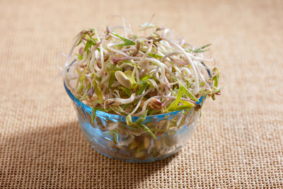 Close-up of salad in glass on table