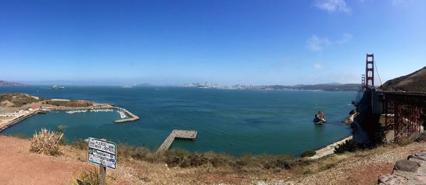 Scenic view of sea against blue sky