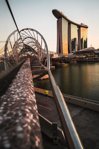Bridge over river against sky