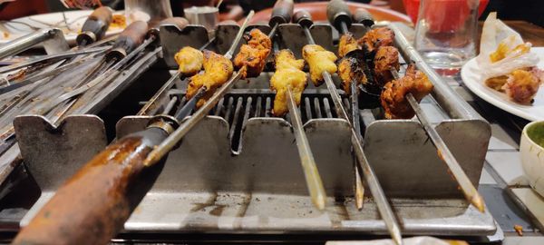 View of food on barbecue grill