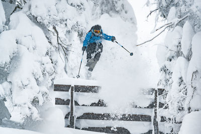 Freeride skier captured mid air in the backcountry, werfenweng, austria.