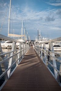 View of pier over sea against sky