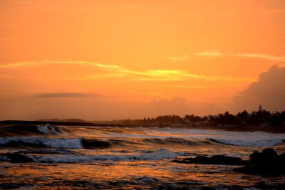 Scenic view of sea against sky during sunset