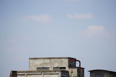 Low angle view of old building against sky