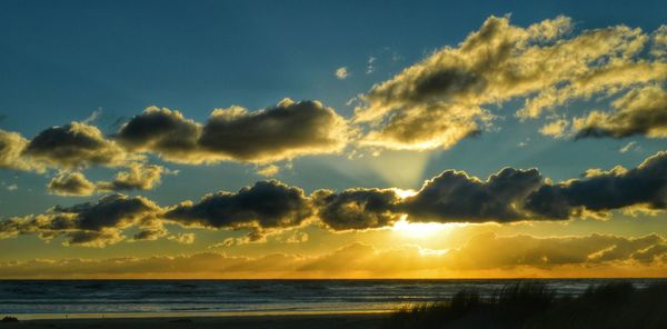 Scenic view of sea at sunset