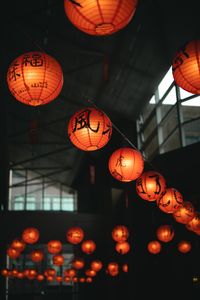 Low angle view of illuminated chandelier