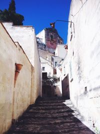 Narrow alley with buildings in background