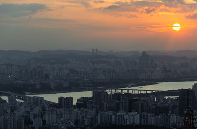 City of seoul with han river during sunset