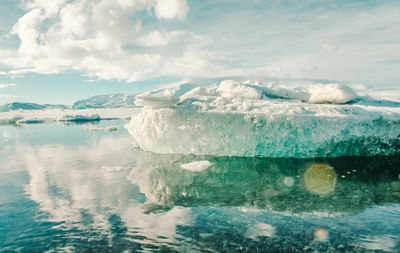 Glacier in mirror sea water landscape photo