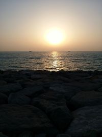 Scenic view of sea during sunset