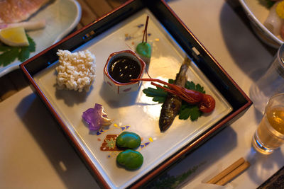 High angle view of fresh meal served on table