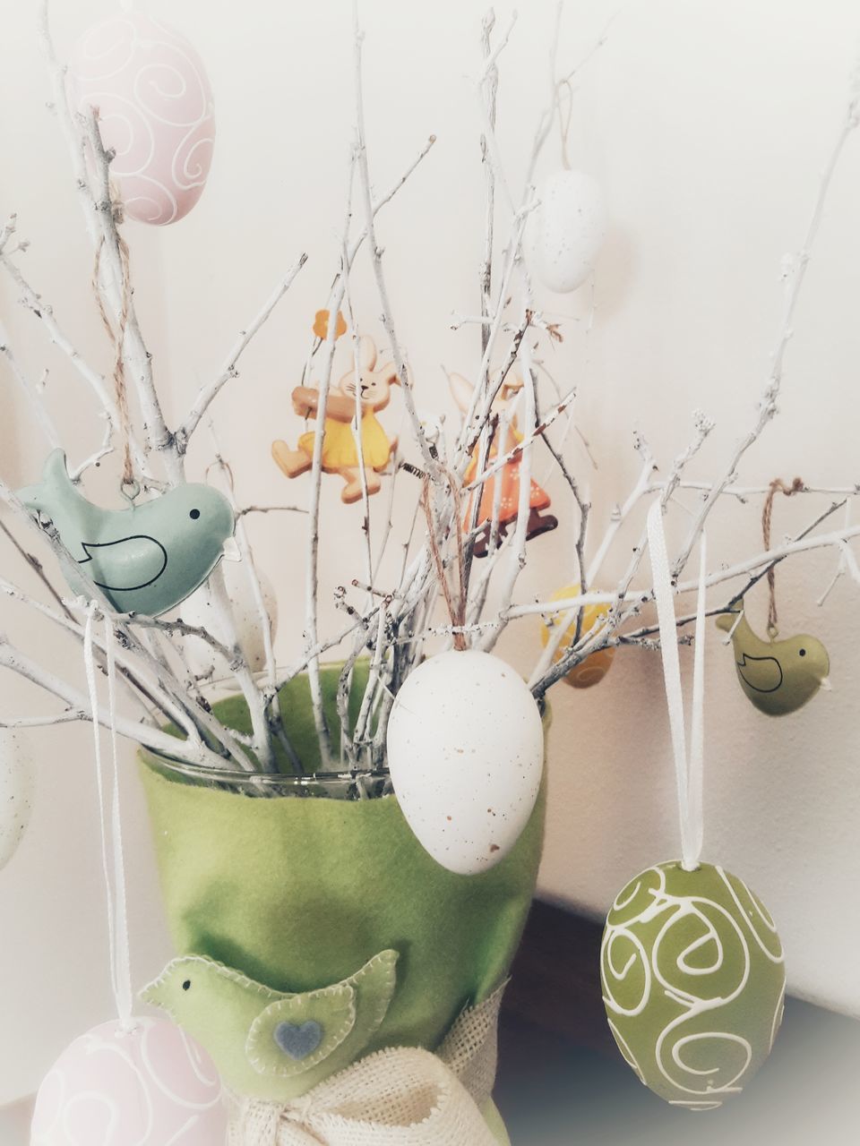 decoration, indoors, no people, easter, animal representation, celebration, egg, representation, hanging, easter egg, holiday, still life, close-up, art and craft, white color, green color, wall - building feature, holiday - event, easter bunny