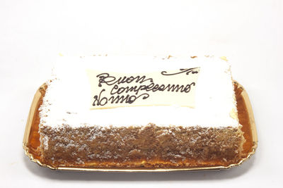 Close-up of cake against white background