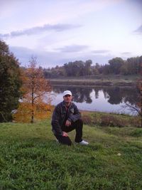 Portrait of a young woman relaxing on lake