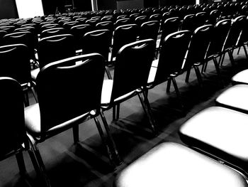 High angle view of empty chairs in stadium