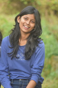 Portrait of a smiling young woman