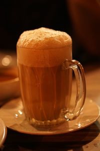 Close-up of coffee served on table