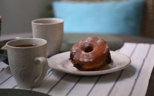 Close-up of coffee served on table