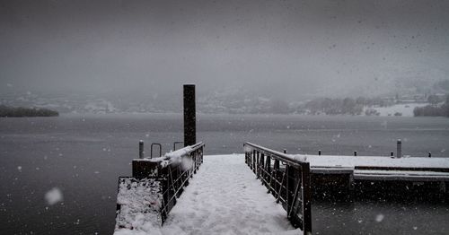 Scenic view of frozen sea against sky during winter